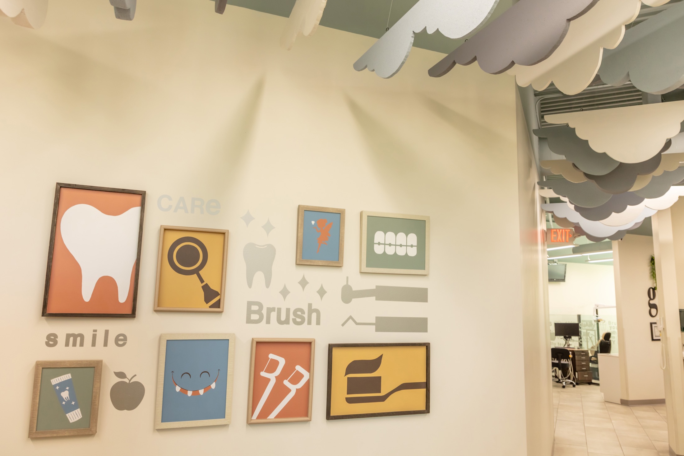 Growing Smiles flat dental artwork and cloud ceiling installation